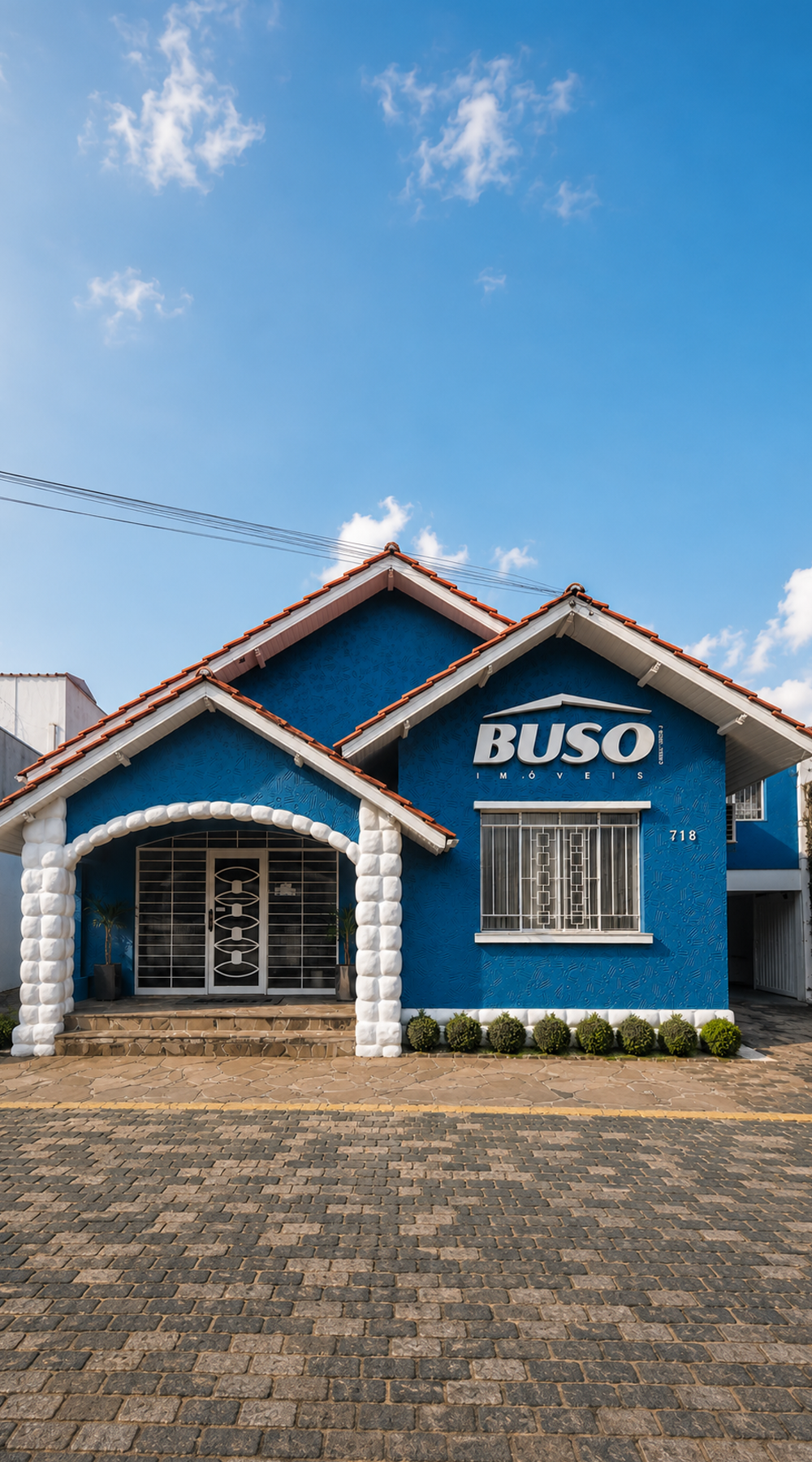 Fachada BUSO Imóveis — Av. Presidente Kennedy, 718 · Rebouças, Curitiba